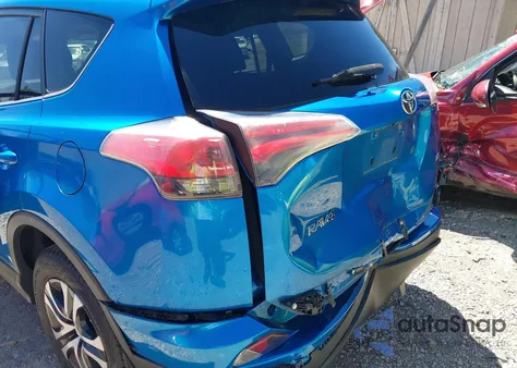 2016 Toyota Rav4 Le z USA, uszkodzony, nr VIN JTMZFREV1GJ094294